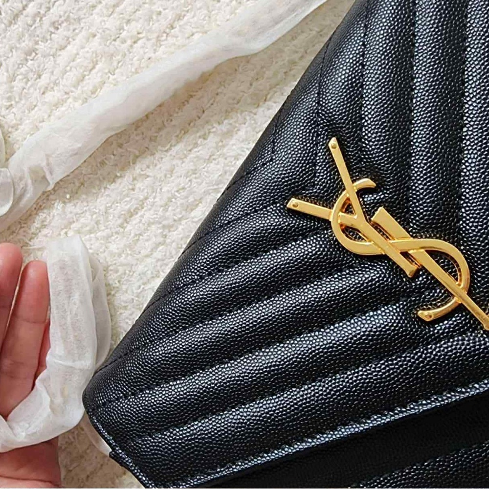 Yves Saint Laurent Black Quilted Clutch with Gold Logo